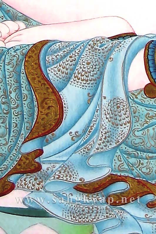 The gold details on his lower garment