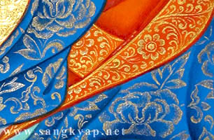 Gold detail on the garments